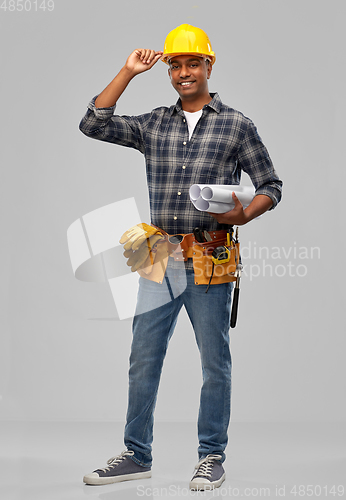 Image of happy indian builder in helmet with blueprint