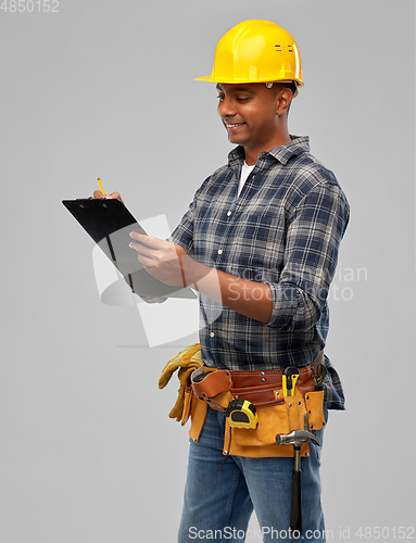 Image of thinking builder with clipboard and pencil