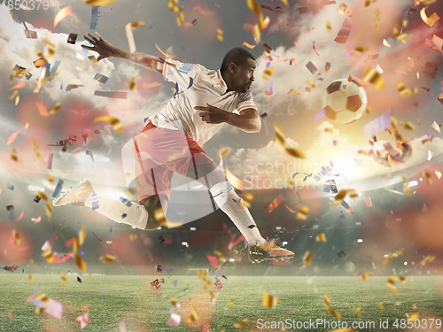 Image of Professional sportsman caught in moment of winning and confetti flying, motion and action