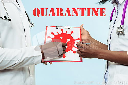 Image of Doctors talking about coronavirus spreading stopping, quarantine and treatment for active cases