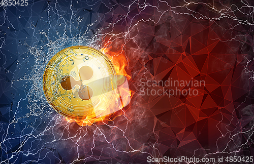 Image of Gold Ripple coin hard fork in fire flame, lightning and water splashes.