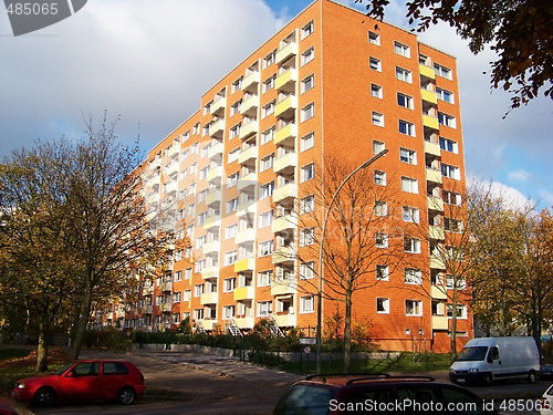 Image of The red many-storeyed house