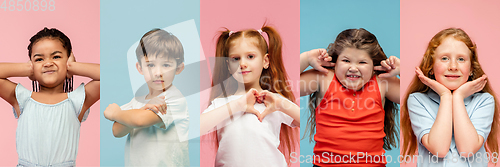 Image of Young and happy kids gesturing isolated on multicolored studio background. Human emotions, facial expression concept