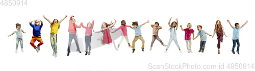 Image of Little and happy kids gesturing isolated on white studio background. Human emotions, facial expression concept