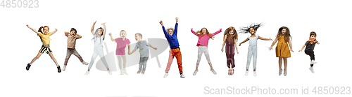 Image of Little and happy kids gesturing isolated on white studio background. Human emotions, facial expression concept