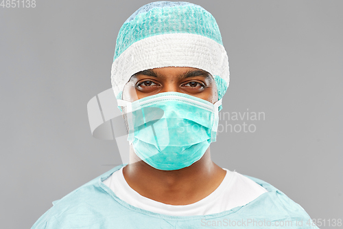 Image of indian male doctor or surgeon in protective wear