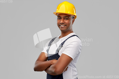 Image of happy indian worker or builder with crossed arms