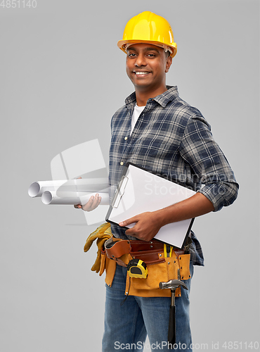 Image of happy indian builder with blueprint and clipboard