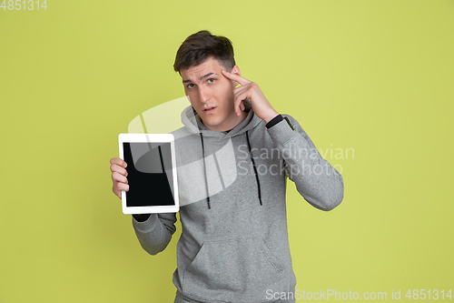 Image of Caucasian man\'s portrait isolated on yellow studio background - freaky model