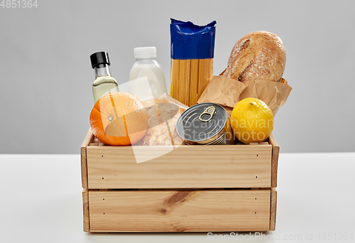 Image of food in wooden box on table