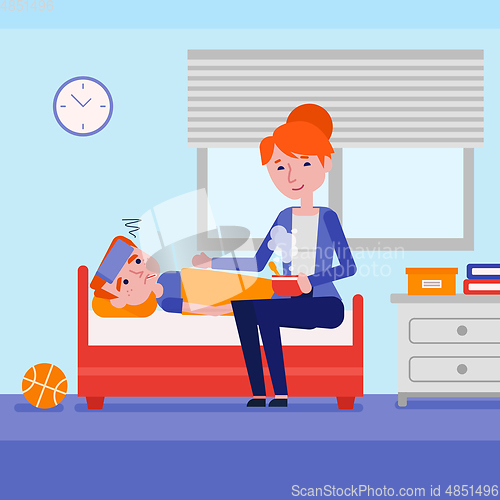 Image of Young mother checking temperature of her sick son.