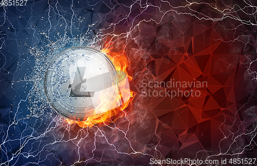 Image of Gold Litecoin coin hard fork in fire flame, lightning and water splashes.