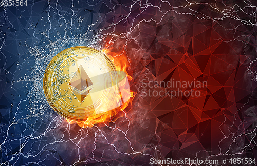 Image of Gold ethereum coin hard fork in fire flame, lightning and water splashes.