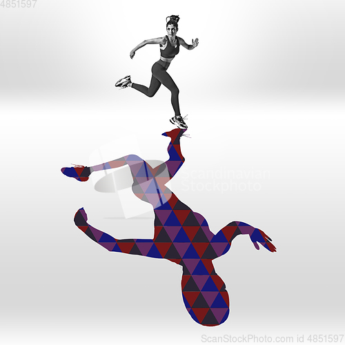 Image of Young caucasian sportswoman isolated on studio background with shadow, modern artwork. Abstract trendy design.