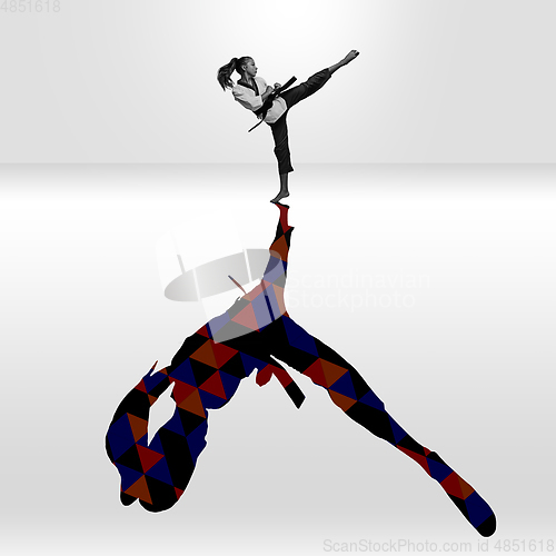 Image of Young caucasian sportswoman isolated on studio background with shadow, modern artwork. Abstract trendy design.