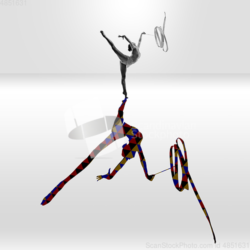 Image of Young caucasian sportswoman isolated on studio background with shadow, modern artwork. Abstract trendy design.