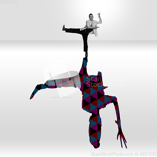 Image of Young caucasian dancer isolated on studio background with shadow, modern artwork. Abstract trendy design.