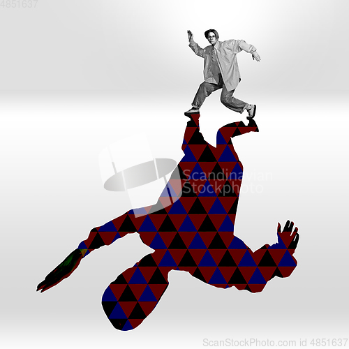 Image of Young caucasian dancer isolated on studio background with shadow, modern artwork. Abstract trendy design.