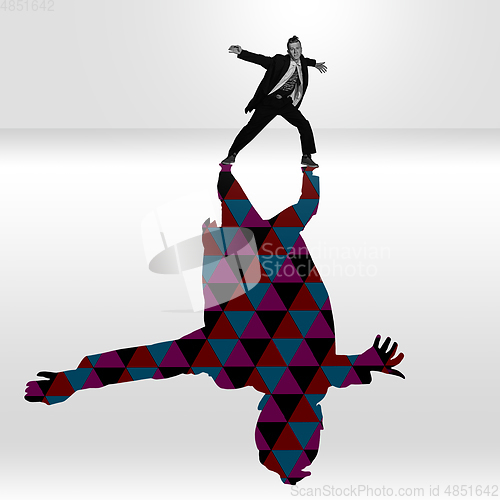 Image of Young caucasian dancer isolated on studio background with shadow, modern artwork. Abstract trendy design.