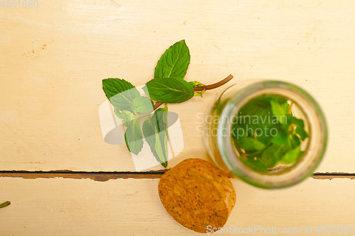 Image of fresh mint leaves on a glass jar