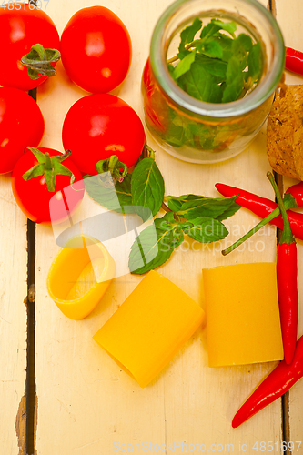 Image of Italian pasta paccheri with tomato mint and chili pepper