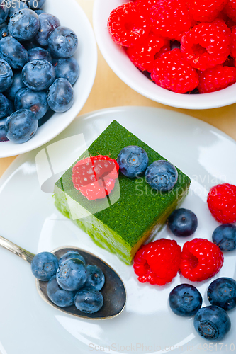 Image of green tea matcha mousse cake with berries