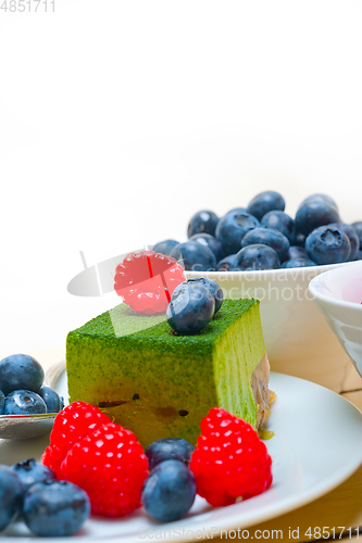 Image of green tea matcha mousse cake with berries