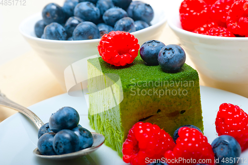 Image of green tea matcha mousse cake with berries