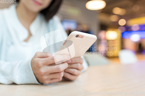 Image of Woman use of smartphone
