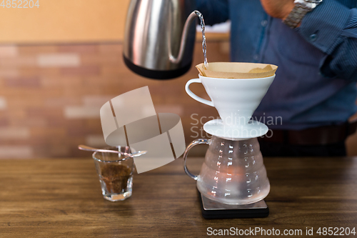 Image of Barista making a drip coffee