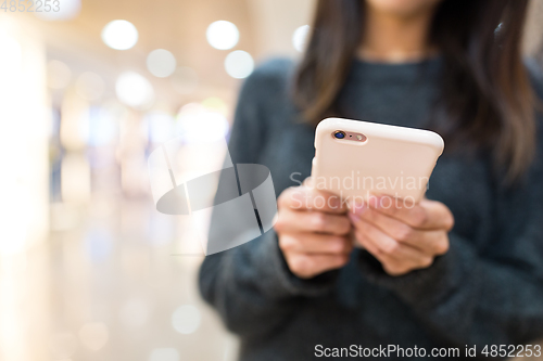 Image of Woman use of mobile phone