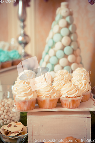 Image of sweets on the wedding table. Vintage color.