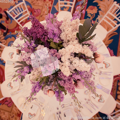 Image of Festive table decoration in Lilac colours.