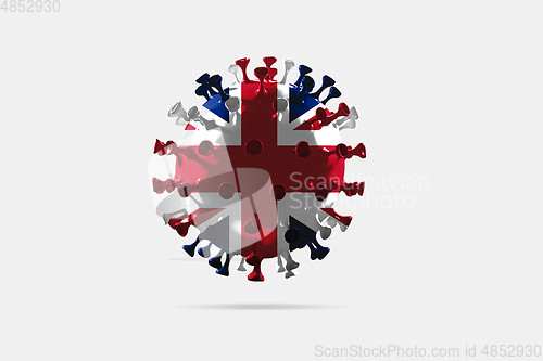 Image of Model of COVID-19 coronavirus colored in national United Kingdom flag, concept of pandemic spreading