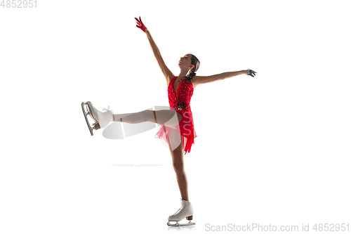 Image of Girl figure skating isolated on white studio backgound with copyspace