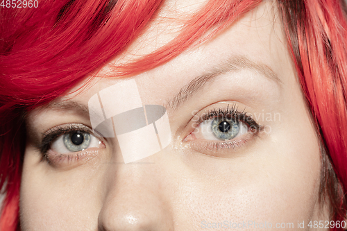 Image of Close up of face of beautiful caucasian young woman, focus on eyes