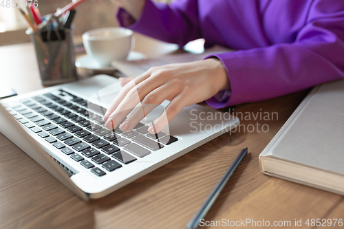 Image of Young caucasian business woman working in office, diversity and girl power concept, close up