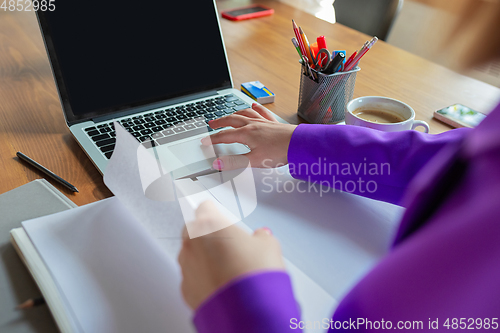 Image of Young caucasian business woman working in office, diversity and girl power concept, close up