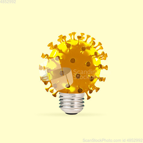 Image of Lightbulb made of models of COVID-19 coronavirus, concept of pandemic spreading