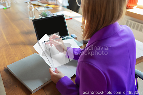 Image of Young caucasian business woman working in office, diversity and girl power concept