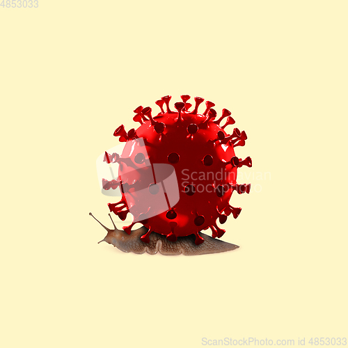 Image of Snail made of models of COVID-19 coronavirus, concept of pandemic spreading