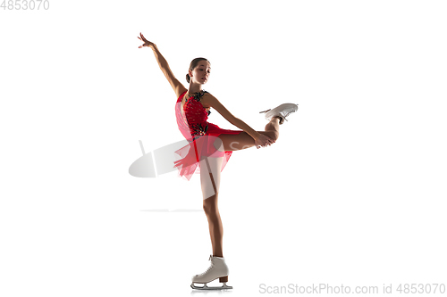 Image of Girl figure skating isolated on white studio backgound with copyspace