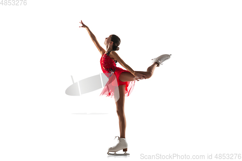 Image of Girl figure skating isolated on white studio backgound with copyspace