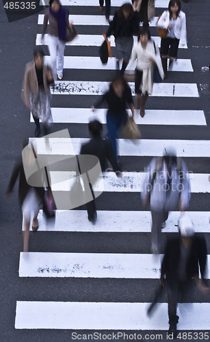 Image of People crossing the street