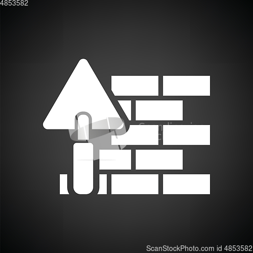 Image of Icon of brick wall with trowel