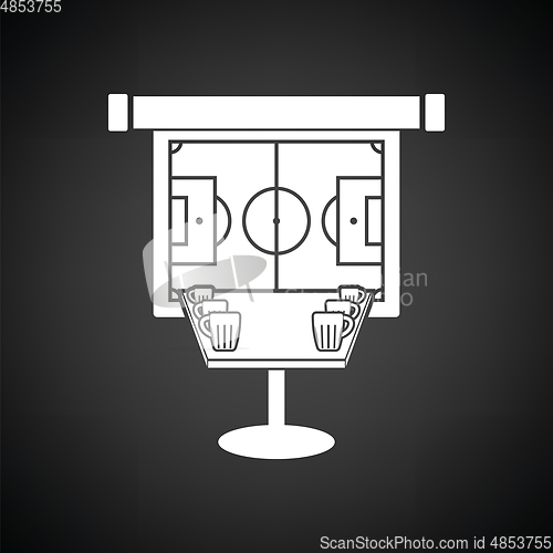 Image of Sport bar table with mugs of beer and football translation on pr