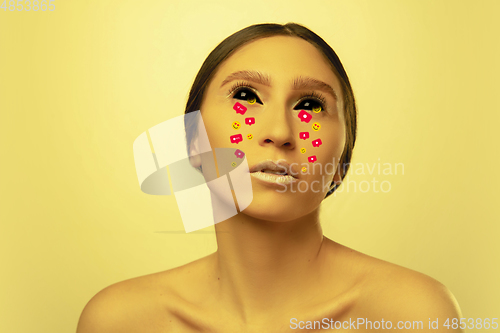 Image of Tears illustrated of social media activity signs on female face in neon light. Real life versus online lifestyle, addiction to modern technologies