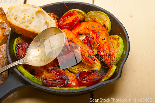 Image of roasted shrimps with zucchini and tomatoes