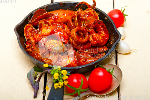 Image of fresh seafoos stew on an iron skillet