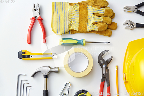 Image of different work tools on white background